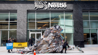 Activists Deliver Giant Trash Monsters to Nestlé Headquarters to Protest Plastic Pollution